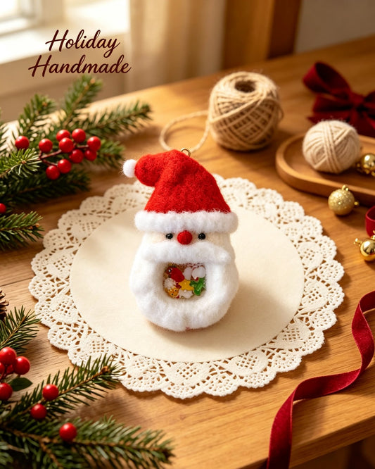 Handmade crochet Santa Christmas charm made with fuzzy yarn on a festive styled backdrop