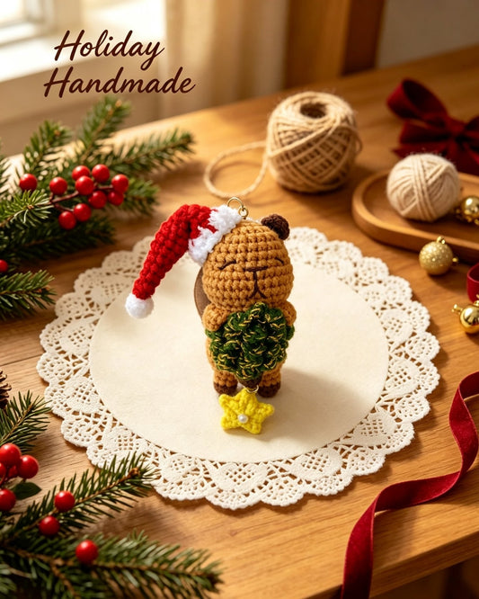 Christmas capybara crochet plush with Santa hat and wreath, holiday scene